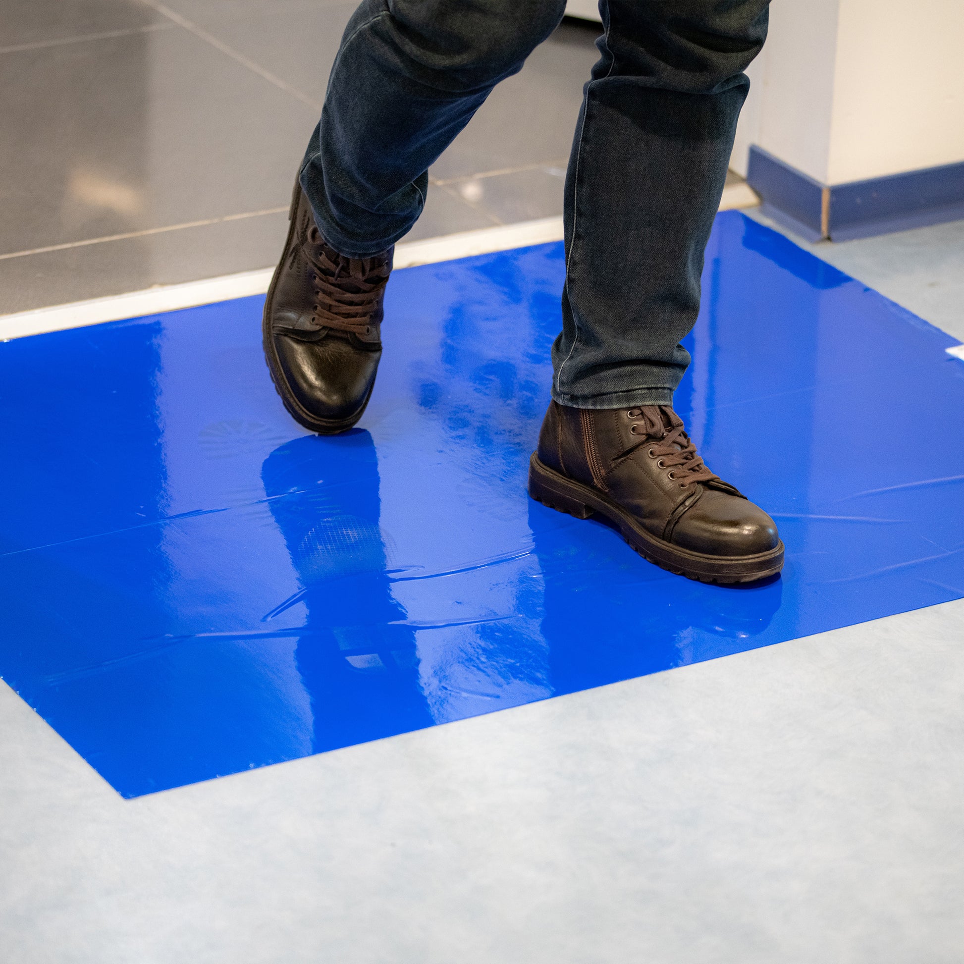 Dust Catching Tacky Mats walking